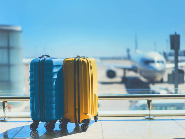 Premium Photo | Travel bag luggage at airport terminal