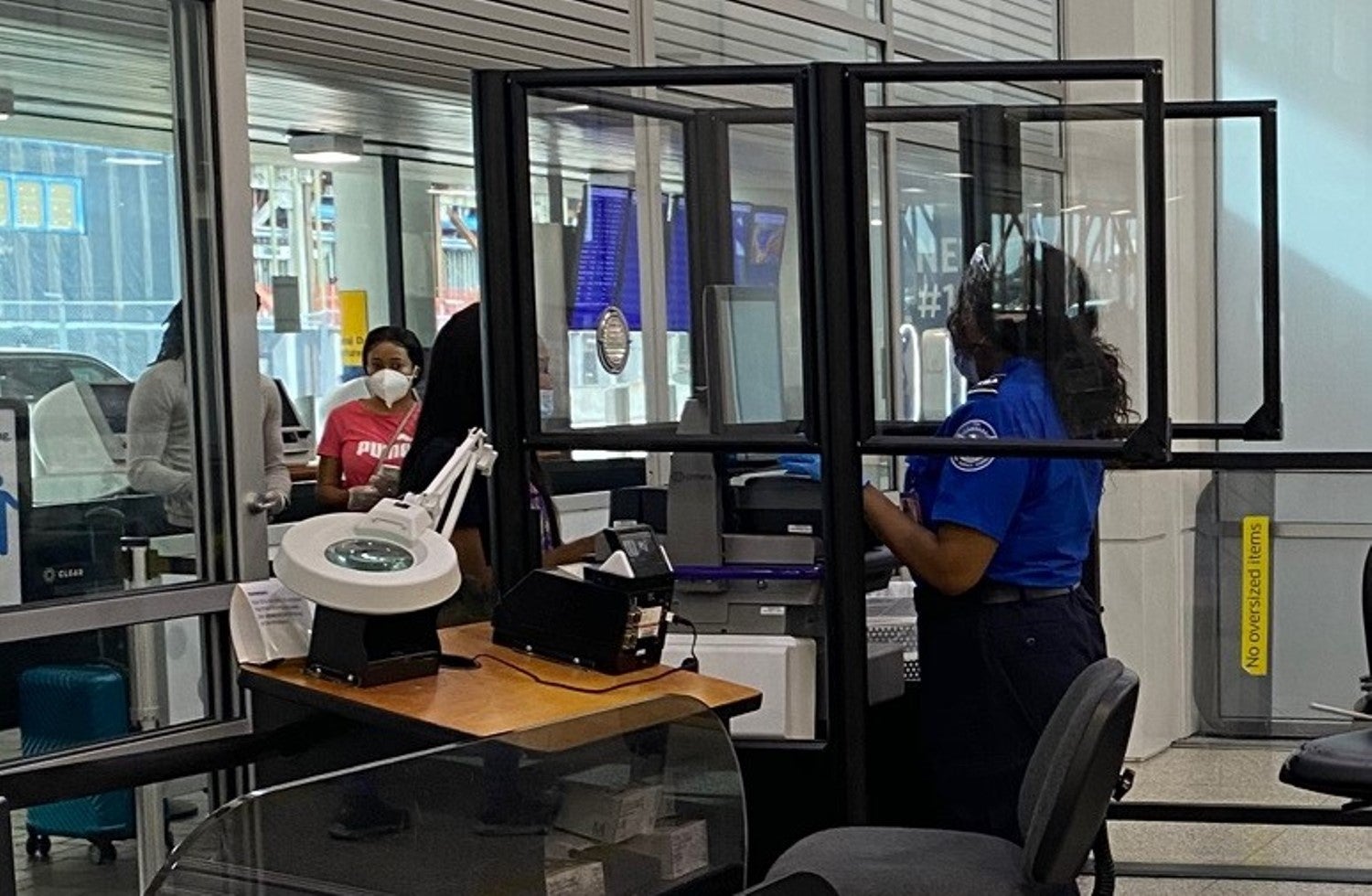 TSA installs acrylic barriers at security checkpoints in LaGuardia Airport