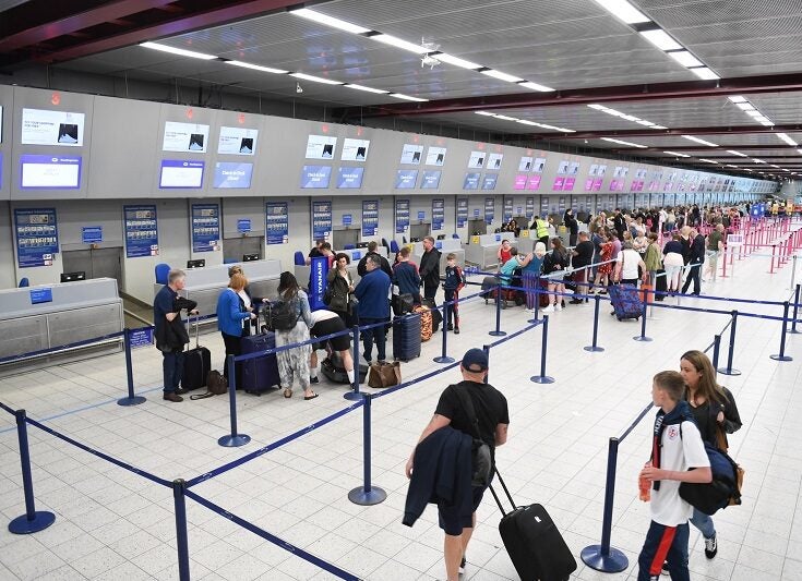 UK airport queues hint that staff shortages could prolong recovery