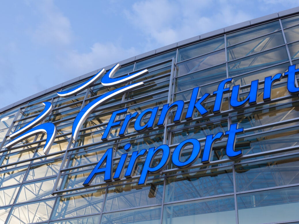 Frankfurt International Airport Logo illuminated at night. Fraport has opted for Zwipe to impliment biometric security at the airport.