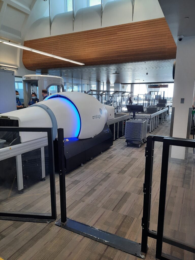 Photo of an Analogic CT x-ray scanner at Plattsburgh International Airport security screening.