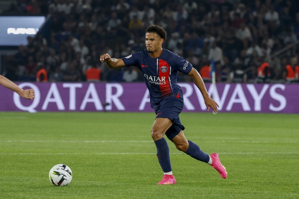 A Paris Saint-Germain Player wearing a shirt with a Qatar Airways sponsorship on the front during a match