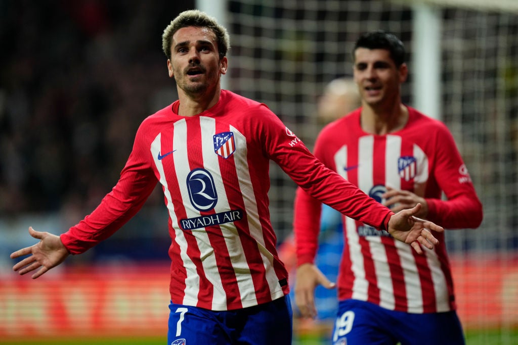 Atletico Madrid player Antoine Griezmann celebrates during a match  wearing a Riyadh Air sponsored shirt. Qatar Airways Manchester CIty Etihad Airways.