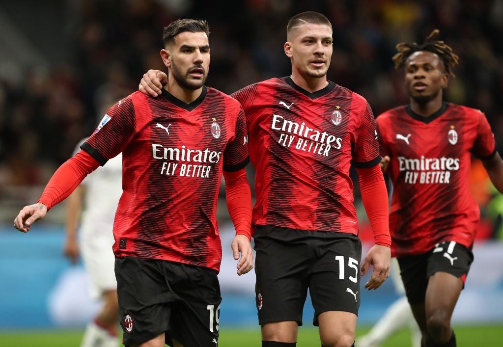 AC Milan players wearing a match shirt featuring the Emirates Airline Logo