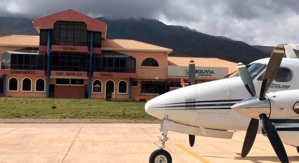 a private jet sat on the runway outside Captain Nicolas Rojas Airport